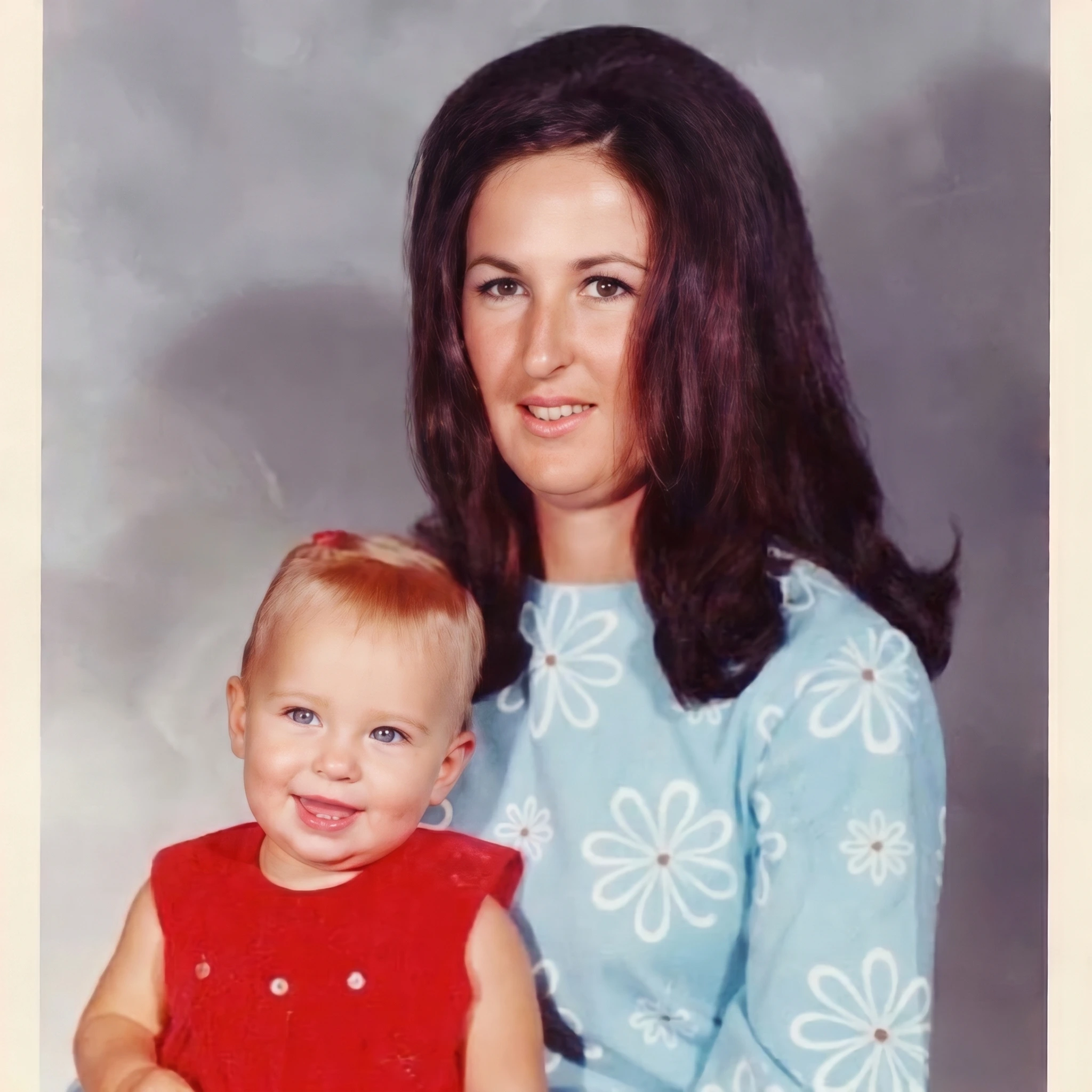 Angela as a baby with her mother
