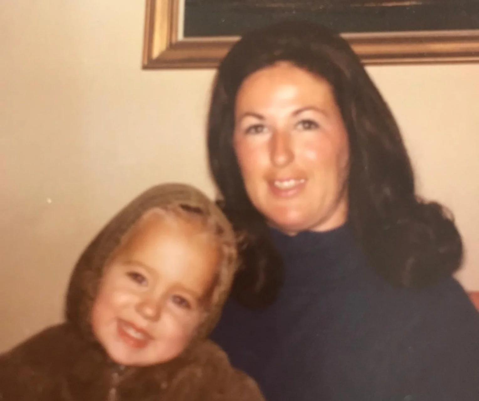 Angela as a young child, with her mother