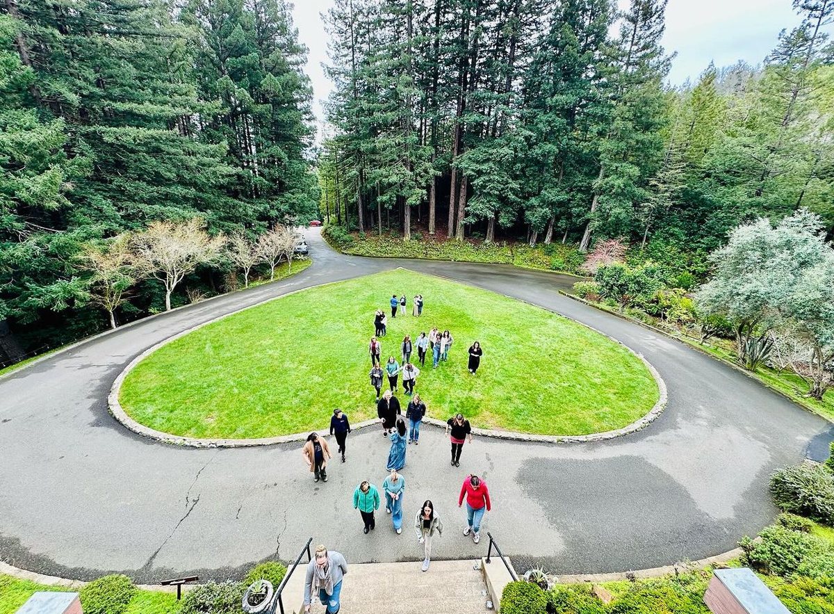 Retreat guests walking together on the lawn