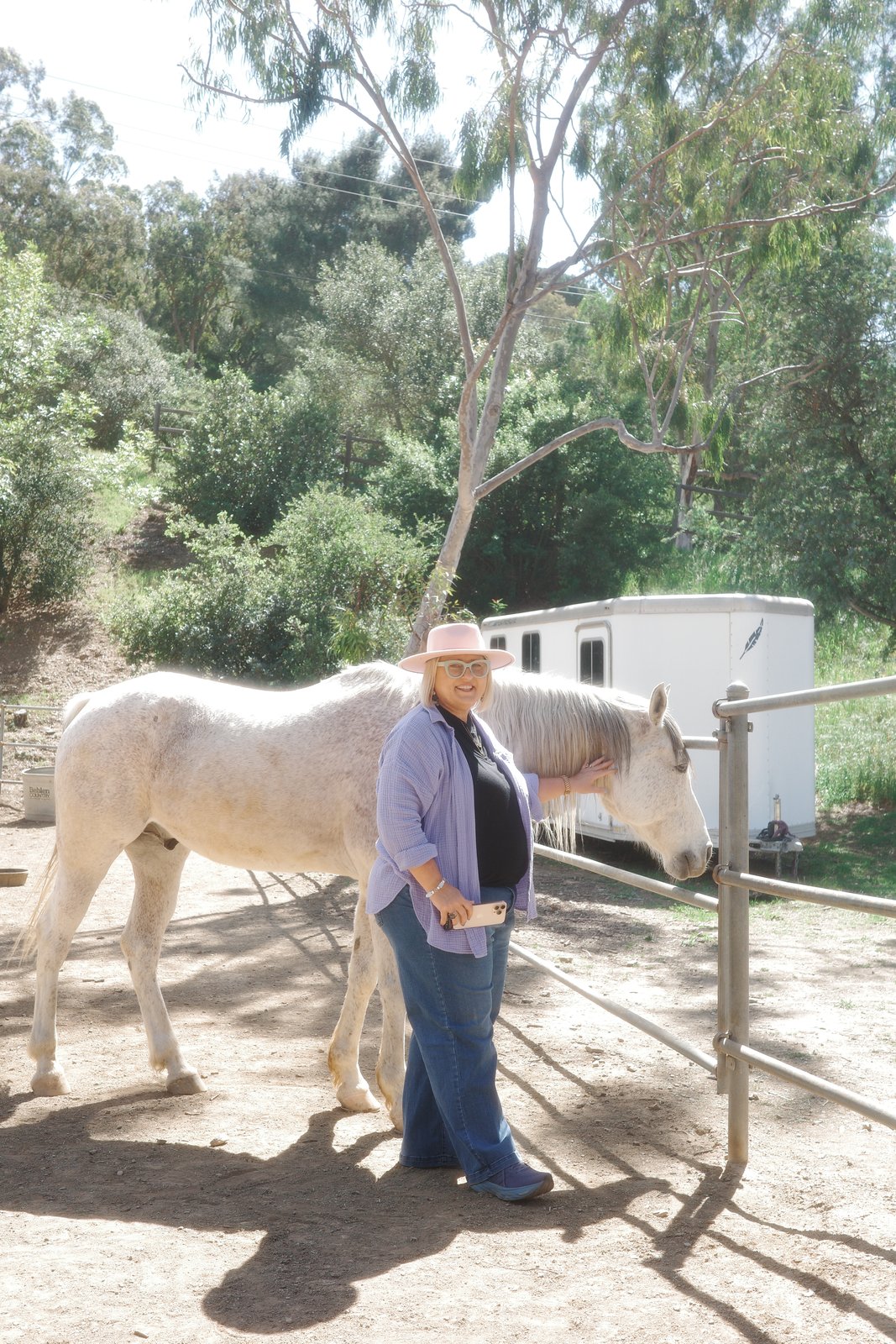 Rose Mary Riggs with a horse at Shakti Ranch