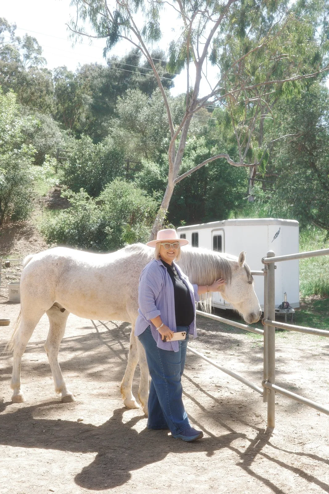 Rose Mary Riggs with a horse at Shakti Ranch